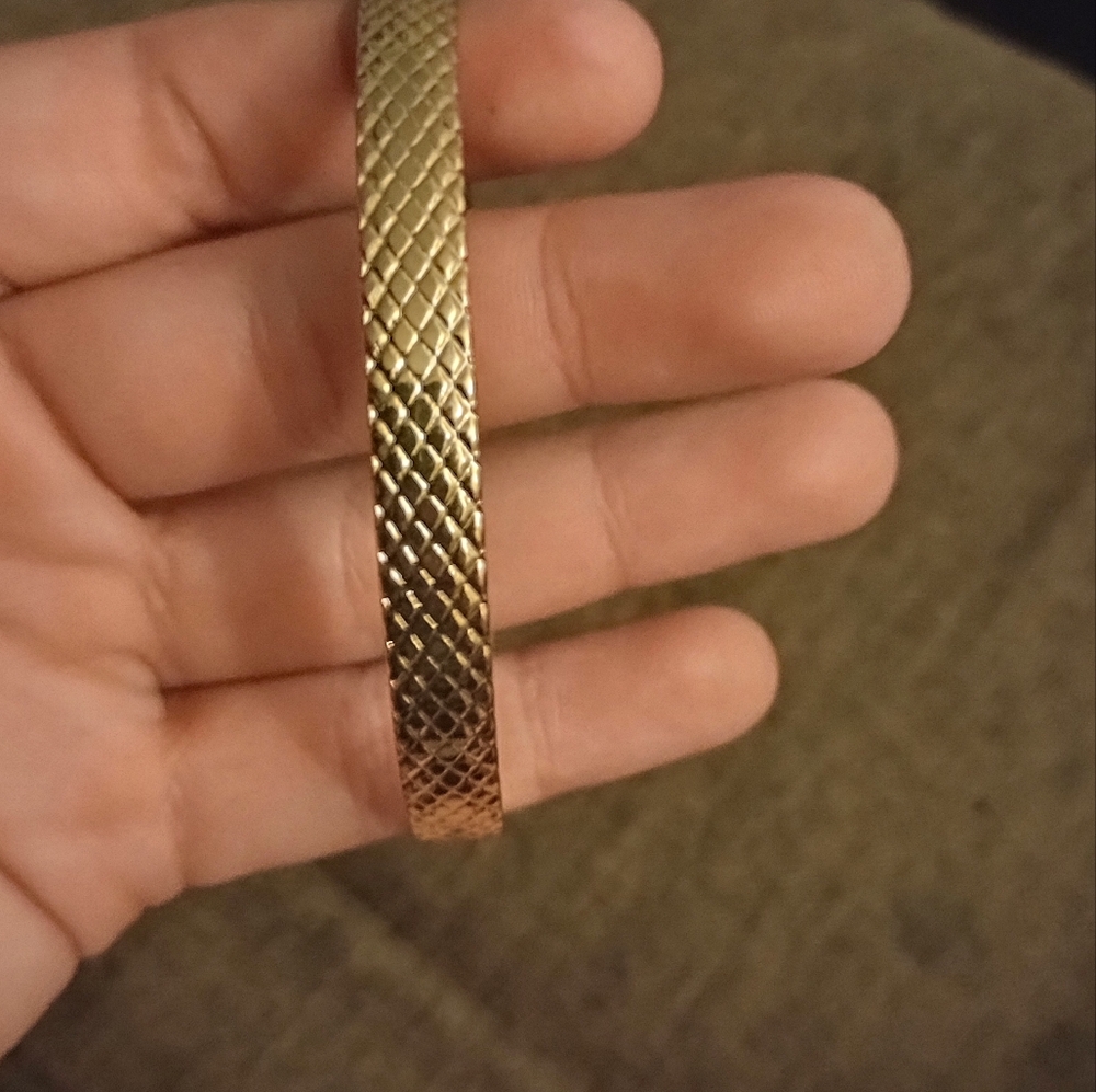 Gold plated bangle w/ snake skin print